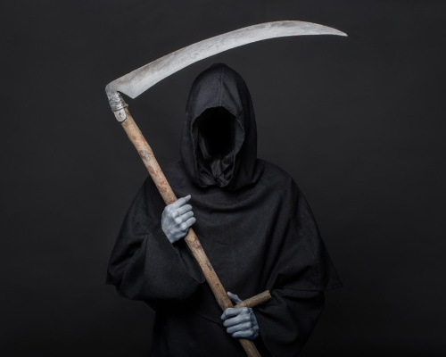 WATCH: Man Protests Open Beaches Dressed As The Grim Reaper