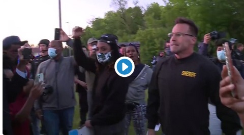 In case you missed it, the sheriff in Flint, Michigan asked protesters what they wanted from him, and they started chanting “walk with us.”  So he left his gear behind and joined the protest.