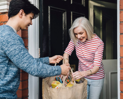 Teens grocery shop for Grandparents. Now a national volunteer effort.